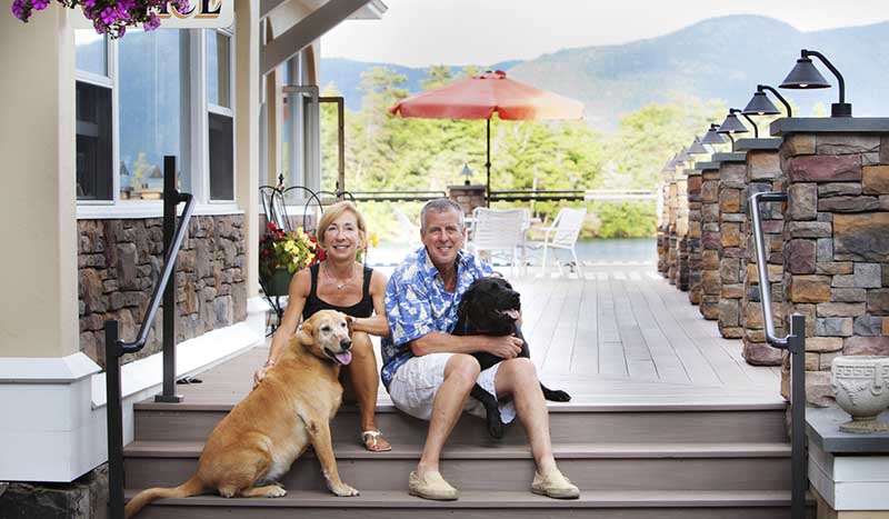 Owners with dogs on deck